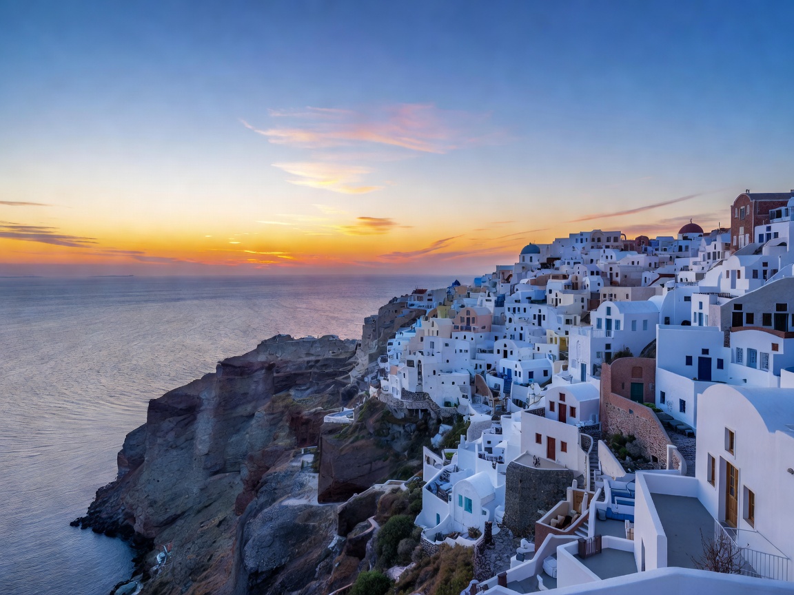 Iconic white and blue caldera domes of Oia village in Santorini Greece at twilight
